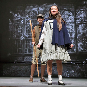 Two Exeter students in a performance of The Secret Garden